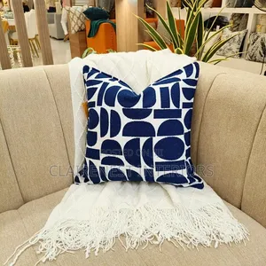 Turn an Ordinary Sofa Into a Statement Piece With Cute Throw Pillows