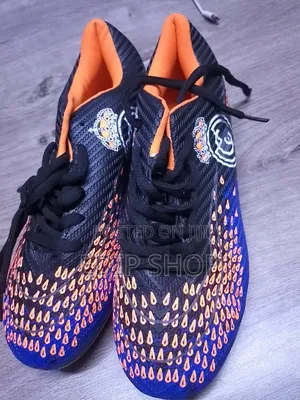 Kids Soccer Boots With Real Madrid Logo. Gift of Free Shin Guards