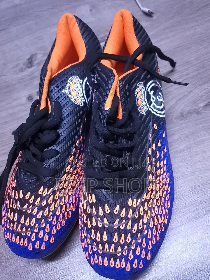 Kids Soccer Boots With Real Madrid Logo. Gift of Free Shin Guards