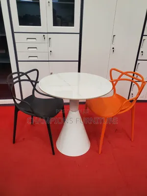 White Trumpet Base Table and Intertwined Chairs Set