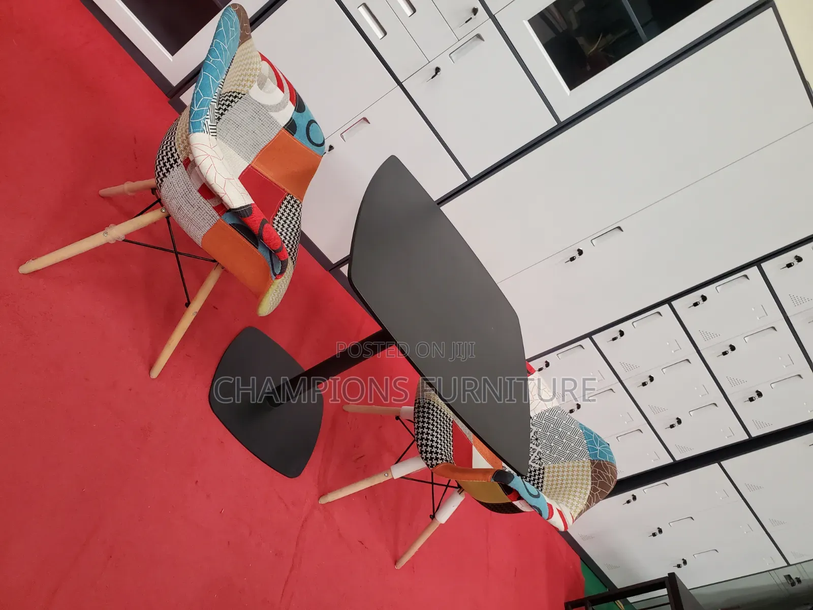 Black Square Table and Patchwork Eames Chairs