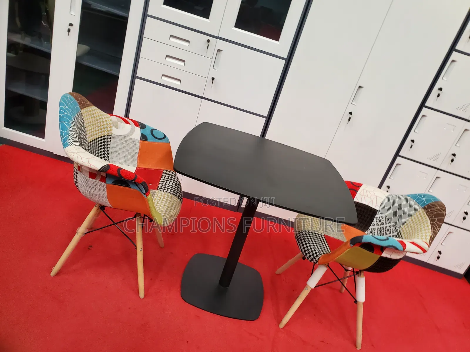 Black Square Table and Patchwork Eames Chairs