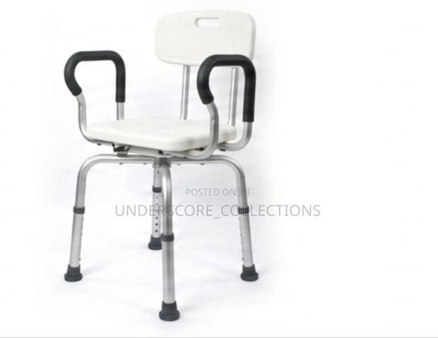Adjustable Swivel Shower Chair With a Backrest and Armrests.
