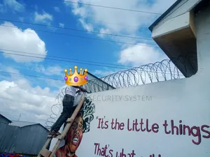Green Razor Wire Installation