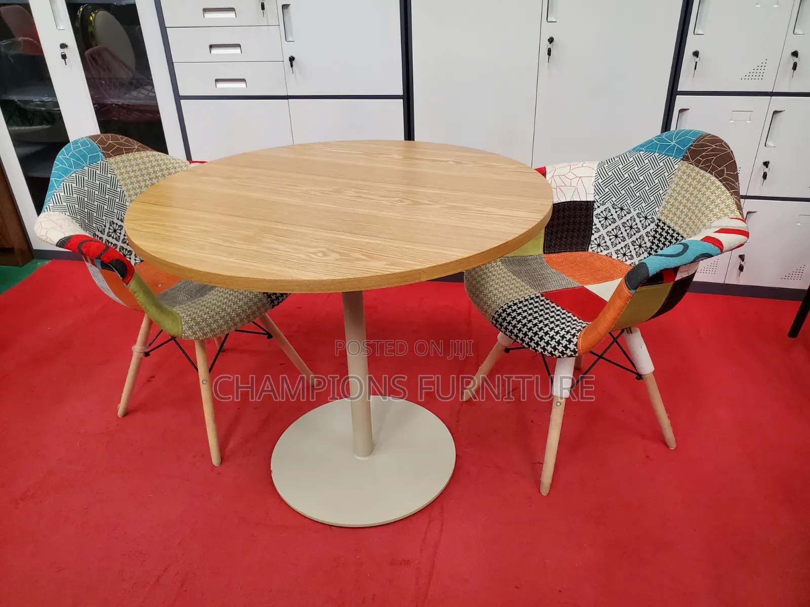 Brown Round Table and Patchwork Eames Chairs Set
