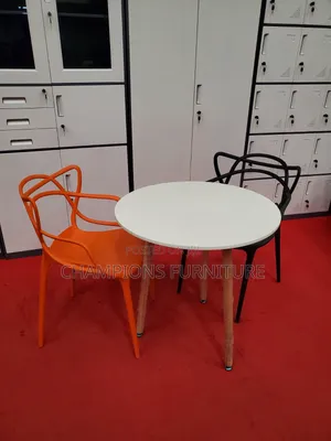 White Round Table and Intertwined Back Chairs Set