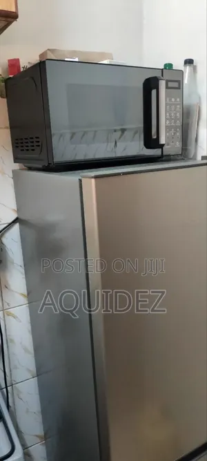 Heir Fridge and Microwave 2 Months Old