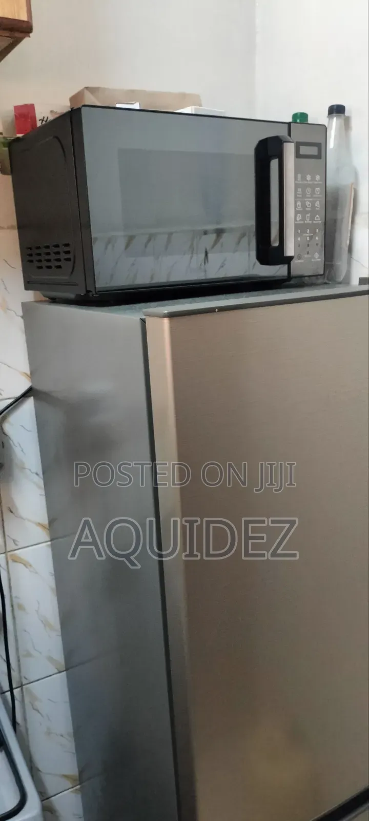 Heir Fridge and Microwave 2 Months Old