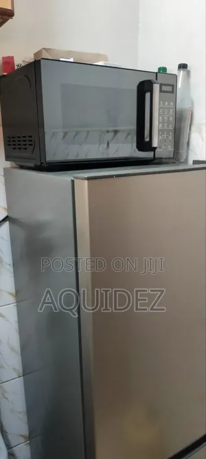 Heir Fridge and Microwave 2 Months Old