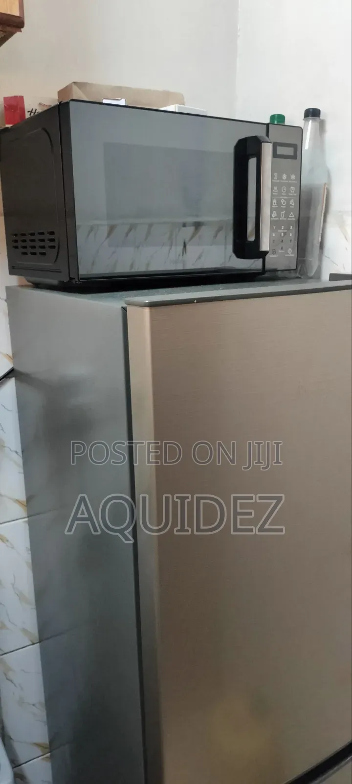 Heir Fridge and Microwave 2 Months Old