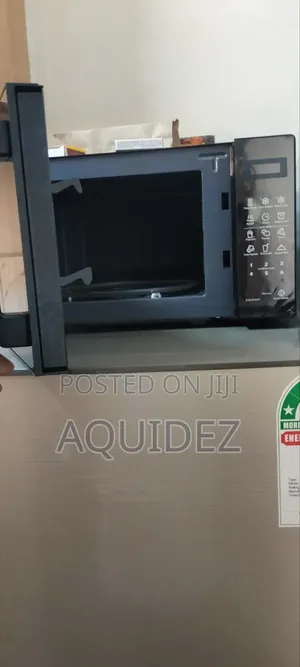Heir Fridge and Microwave 2 Months Old