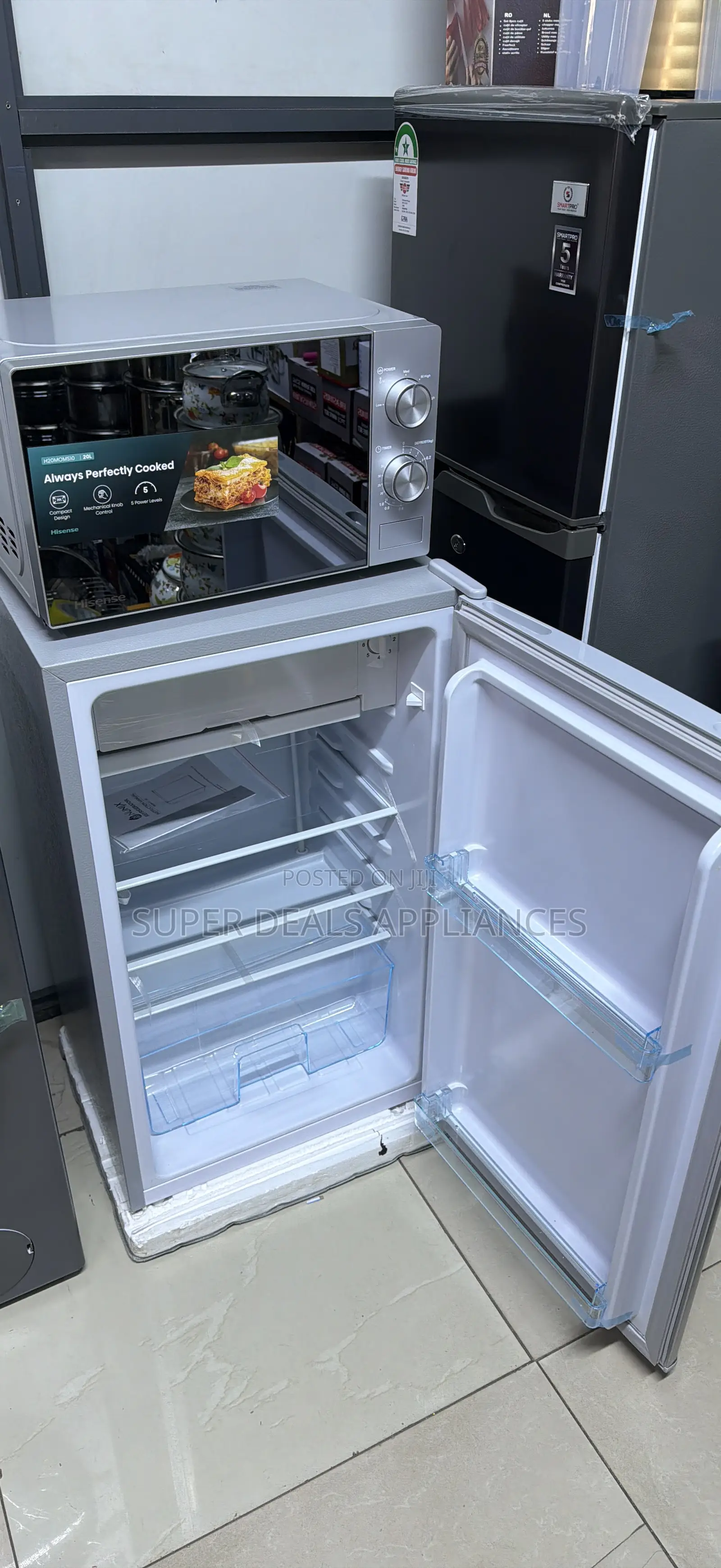 A Smart Pro Refrigerator and an Hisense Microwave