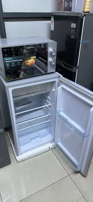 A Smart Pro Refrigerator and an Hisense Microwave