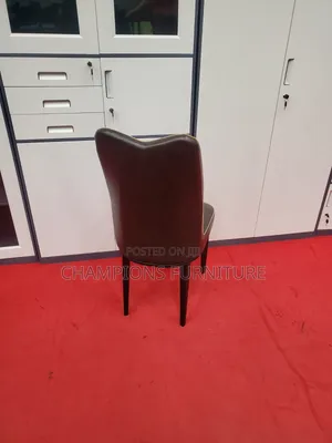 Elegant Brown Leather Dining/Accent Chair