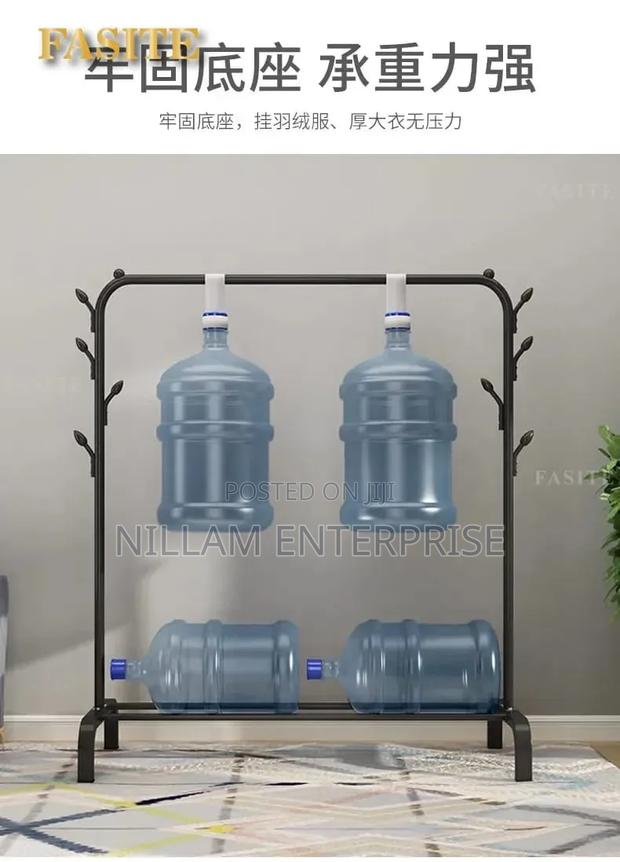 Single Pole Clothes Rack With Hooks and Wheels - thumbnail 3