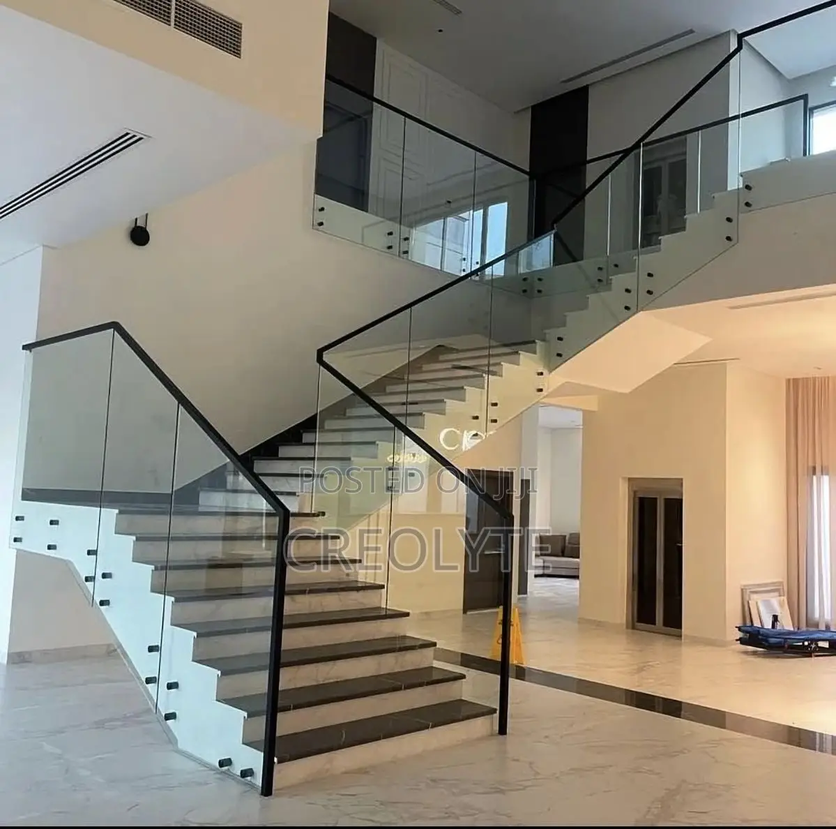 Frameless Glass Balustrade With Steel Handrail – Floating Staircase