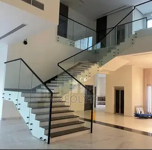 Frameless Glass Balustrade With Steel Handrail – Floating Staircase