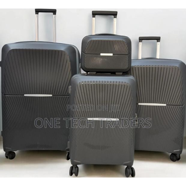 Suitcases, Set of 4pieces Unbreakable ( Rubber) Size 1