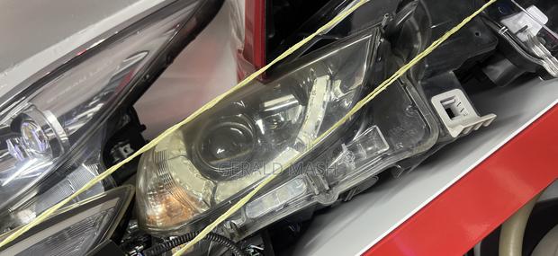 Headlight Mazda Demio Part No:Z
