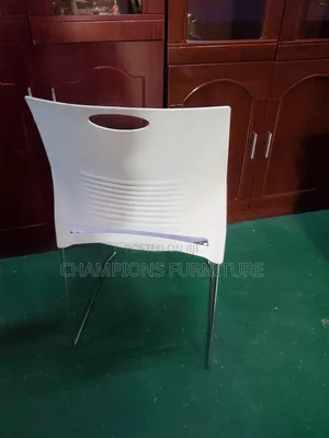 Sleek White Stackable Chaire