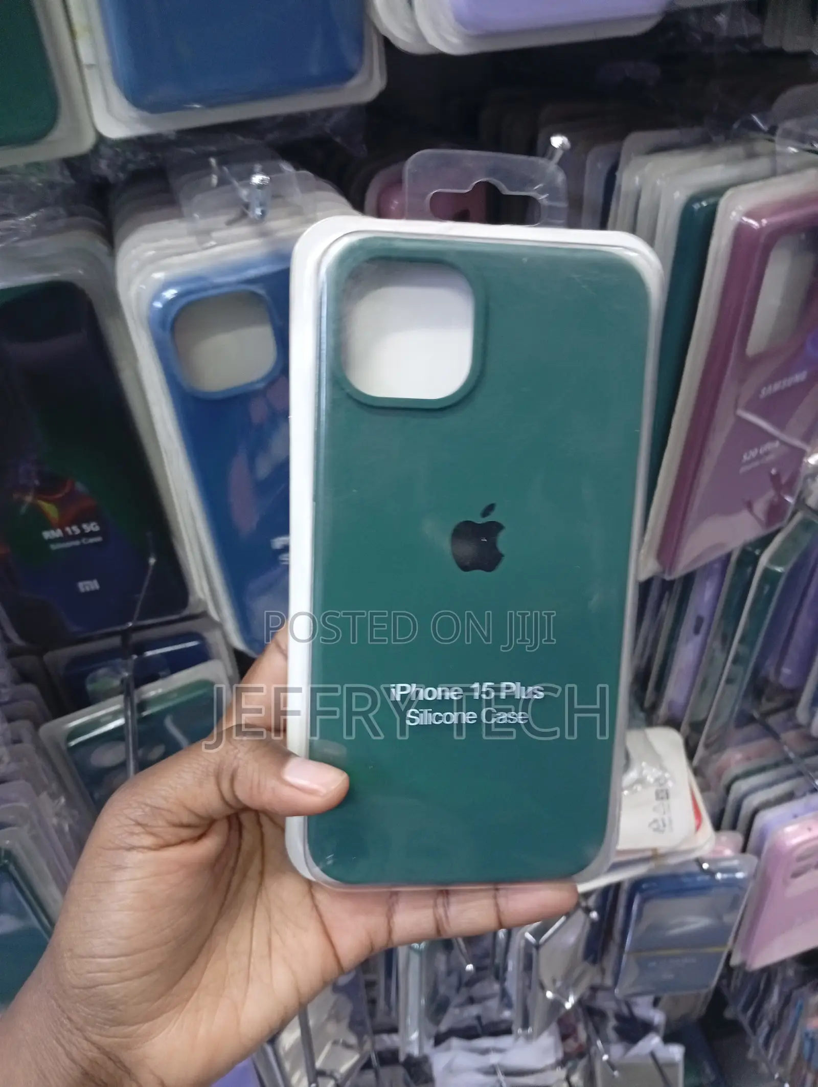 Dark Green Silicone Protective Case Designed for the iPhone 15 Plus.