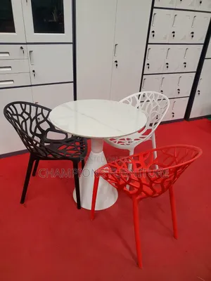 Round Trumpet Base Table and Tree Chairs Set