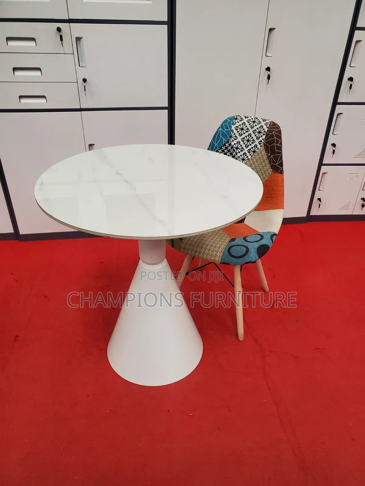 Round Trumpet Base Table and Patchwork Eames Chair