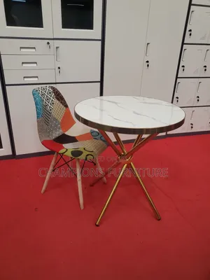 Criss Cross Base Table and Patchwork Eames Chair