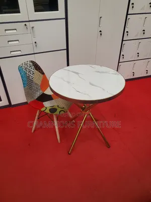 Criss Cross Base Table and Patchwork Eames Chair