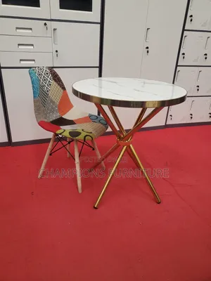 Criss Cross Base Table and Patchwork Eames Chair