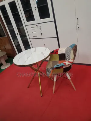 Criss-Cross Base Table and Eames Armchair