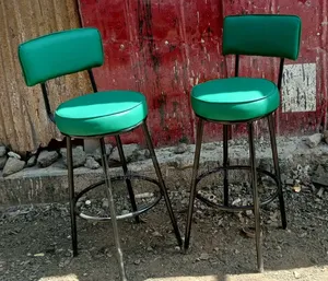 Kitchen Counter Stools With Green Faux Leather.
