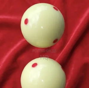 A Red Dotted White Pool Ball for.sale With Polish
