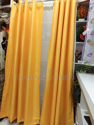 Add a Refined Finish to Your Interiors With Orange and Yellow Curtains