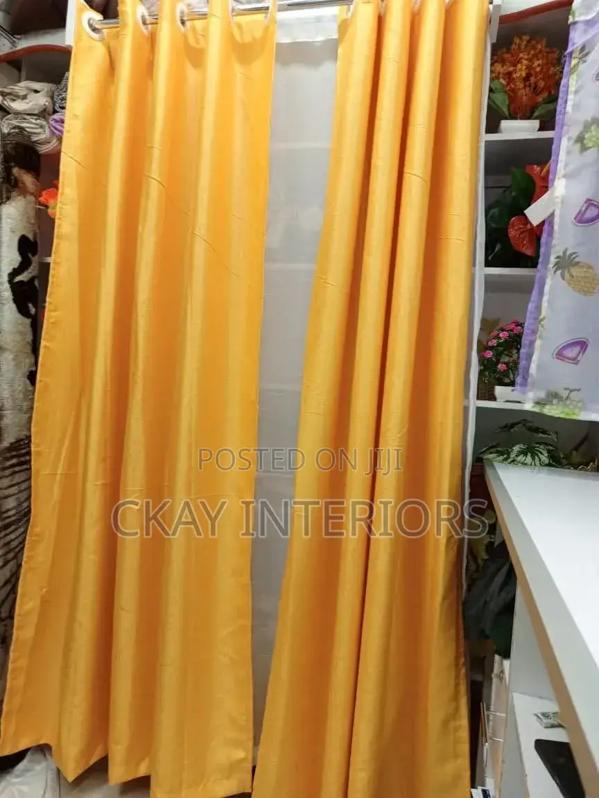 Add a Refined Finish to Your Interiors With Orange and Yellow Curtains
