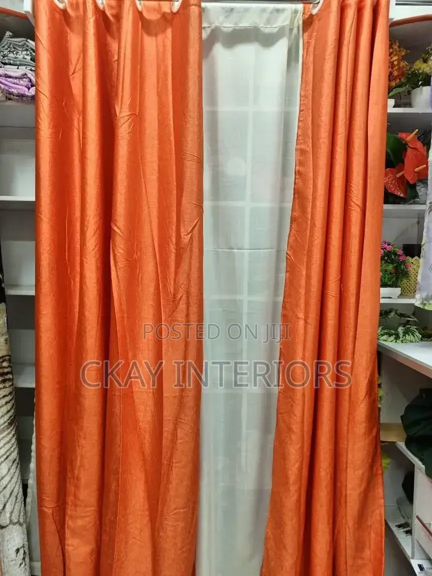 Add a Refined Finish to Your Interiors With Orange and Yellow Curtains