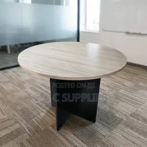 Round Custom Brown Conference Table.