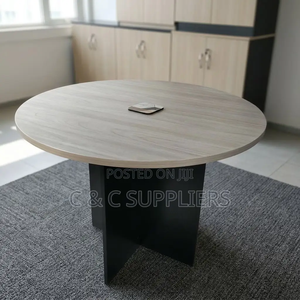 Round Custom Brown Conference Table.