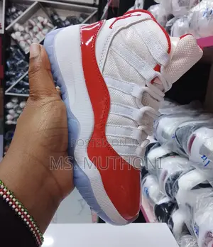 Assortment of Air Jordan 11 Retro Basketball Kids Sneakers (25-30)