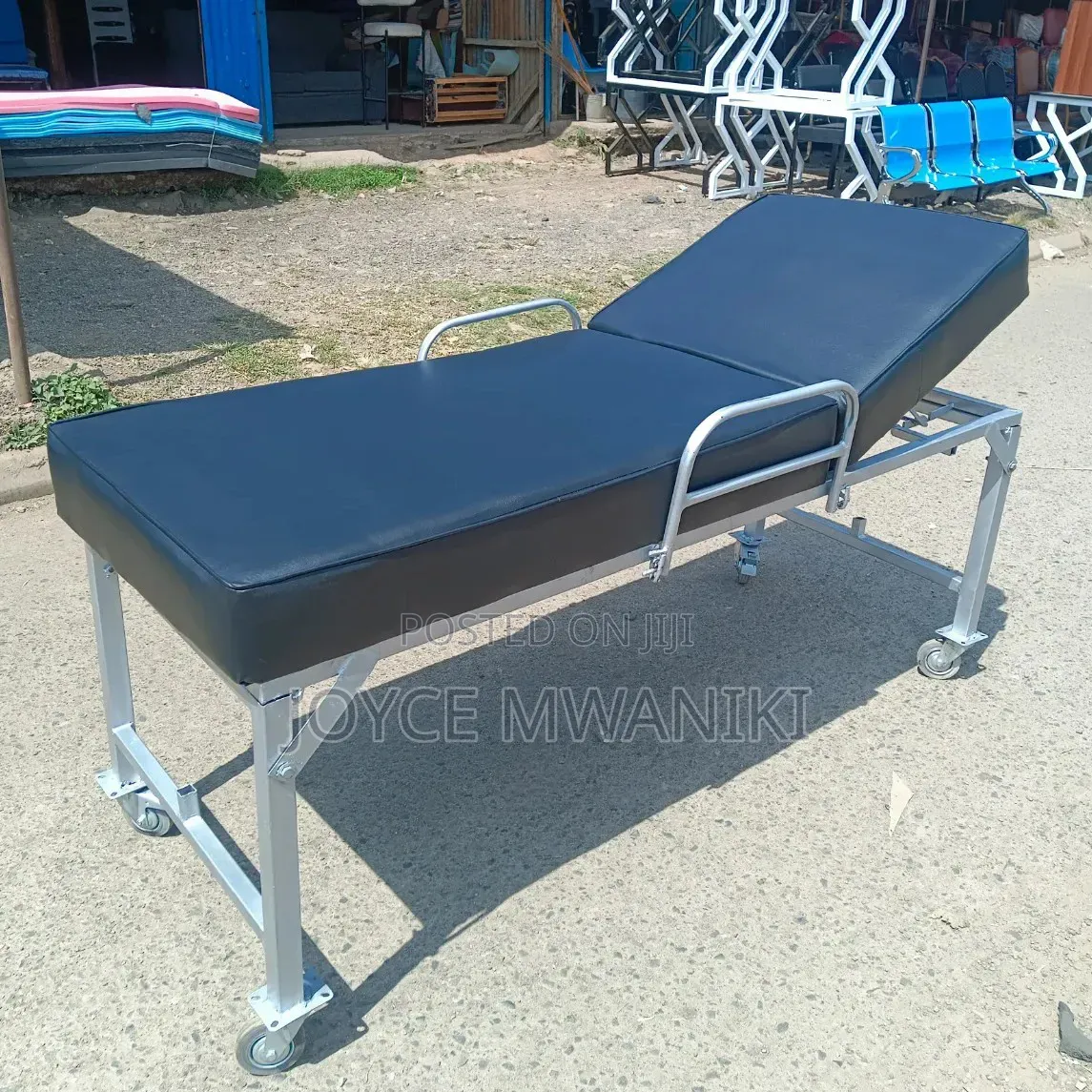 Hospital Examination Bed With Caster Wheels.