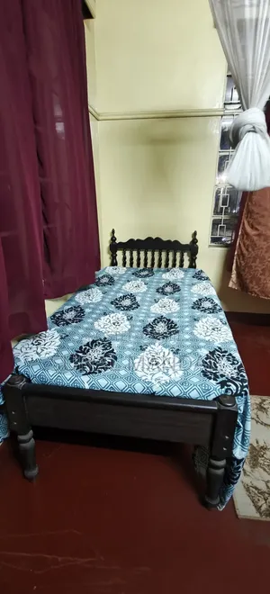 Single Wooden Bed