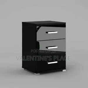 Sleek Black 3-Drawer Nightstand With a Modern High-Gloss Finish.