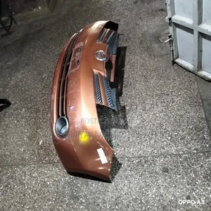 Nissan Note Model 2005 Front Bumper Complete With Grille, Ex Japan