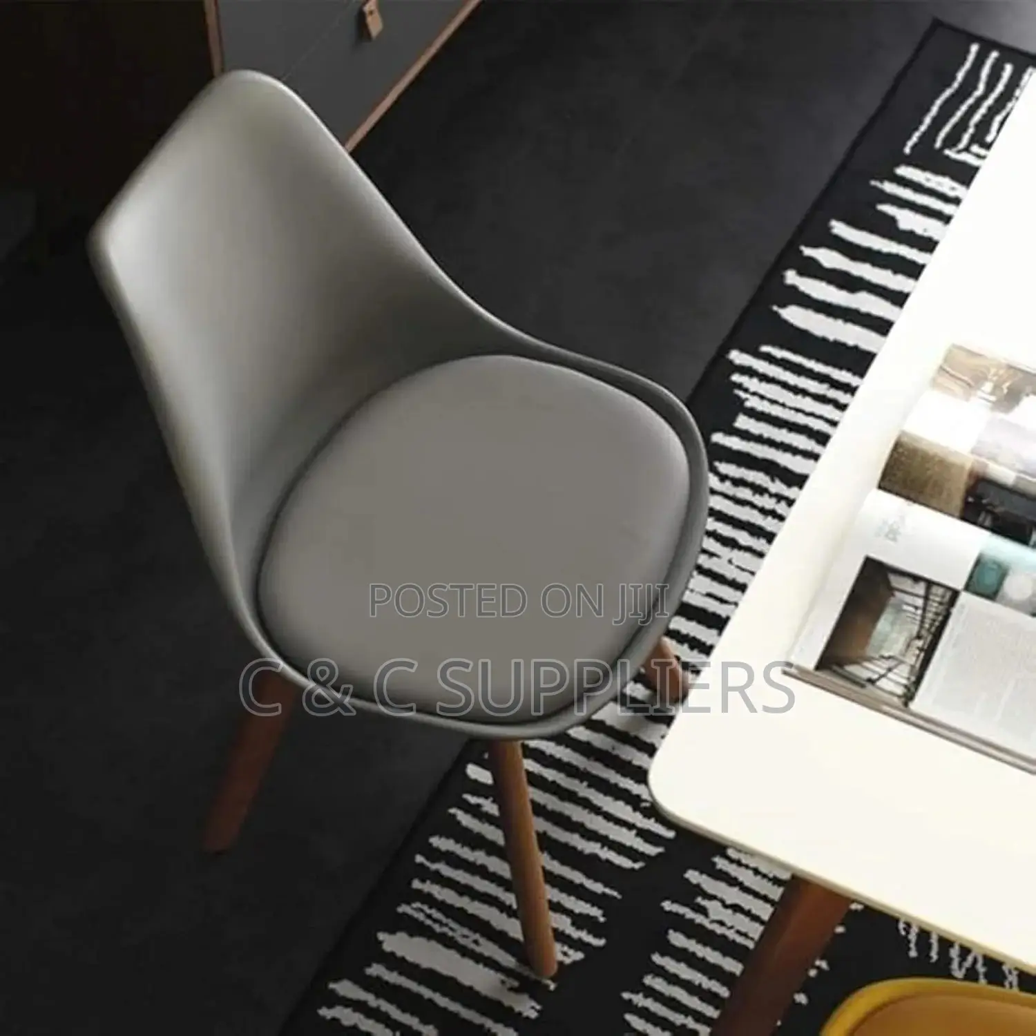 Armless Heavy Duty Eames Plastic Chair.