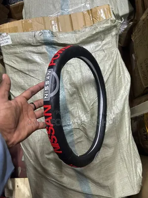 Brand New Rubber Nissan or Subaru Steering Cover Universal Fit