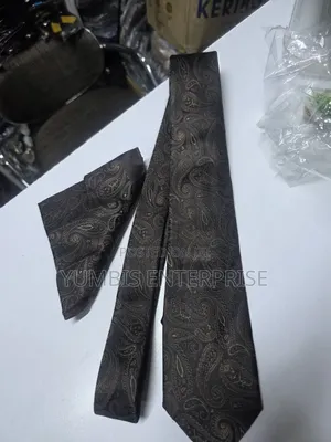 Dark Brown Floral Tie With a Matching Pocket Squares at 700