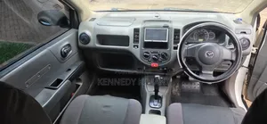 Mazda Familia 2010 White
