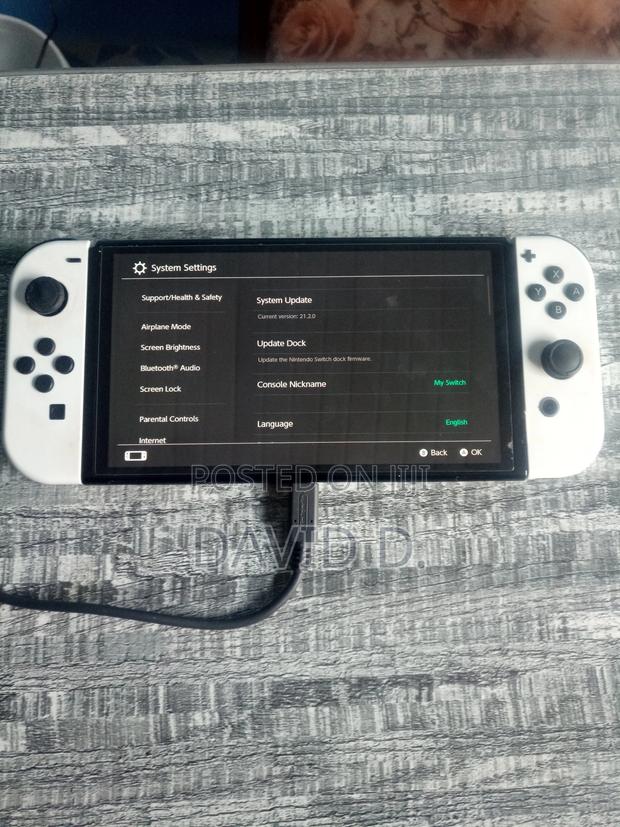 Nintendo Switch OLED + Mario Kart 8 + 256GB SD Card