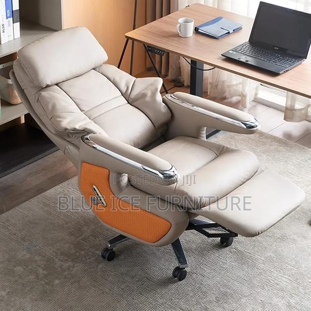 Ergonomic Leather Swivel Chair With Footrest Headrest - thumbnail 2