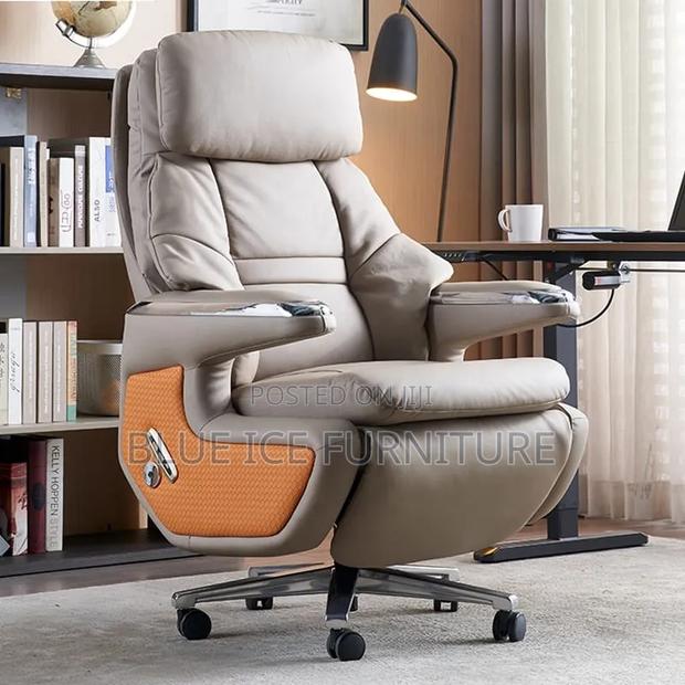 Ergonomic Leather Swivel Chair With Footrest Headrest - thumbnail 4
